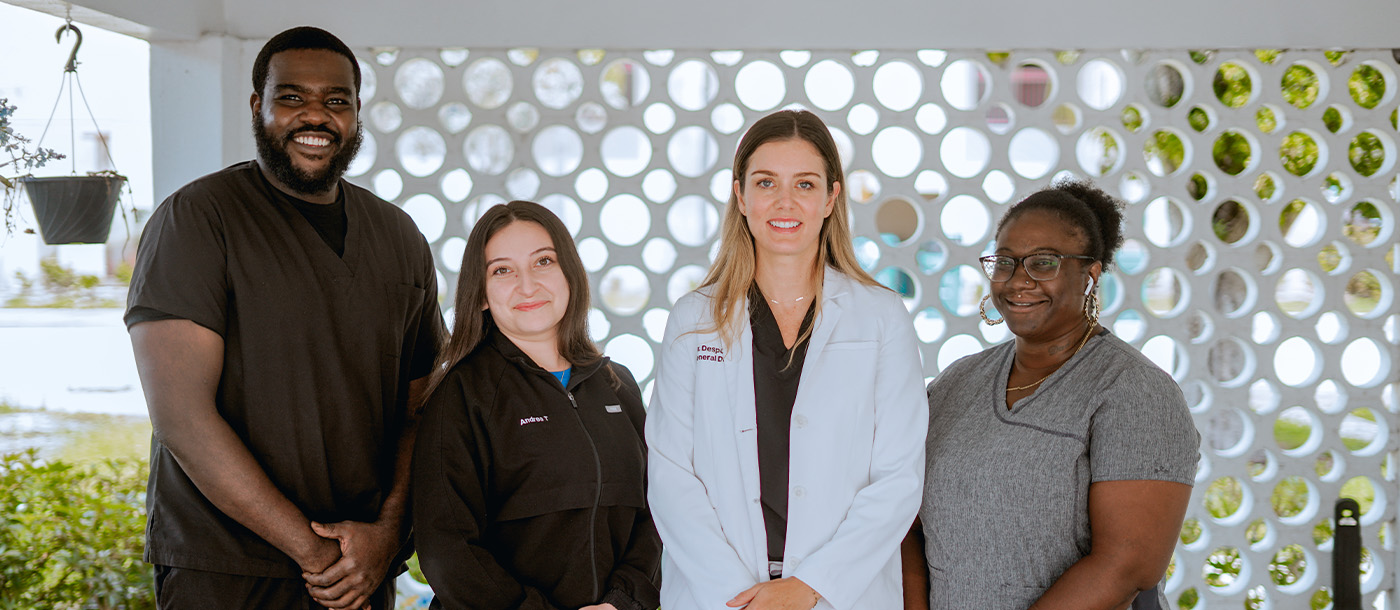Smiling dentist and team members at Family Dentistry of Boynton Beach